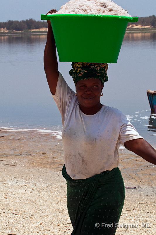 20090529_142420 D300 P1 S1.jpg - Lady carrying basin of salt, Pink Lake